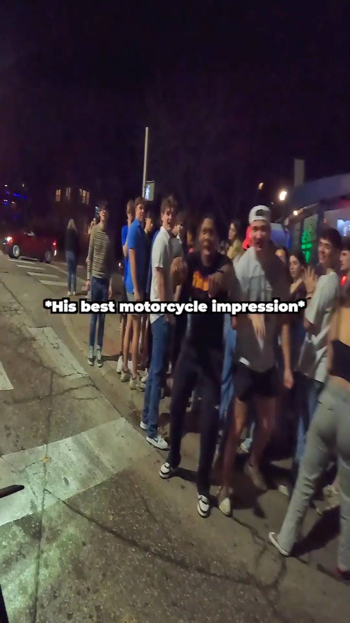 Partiers ask biker to do a wheelie 