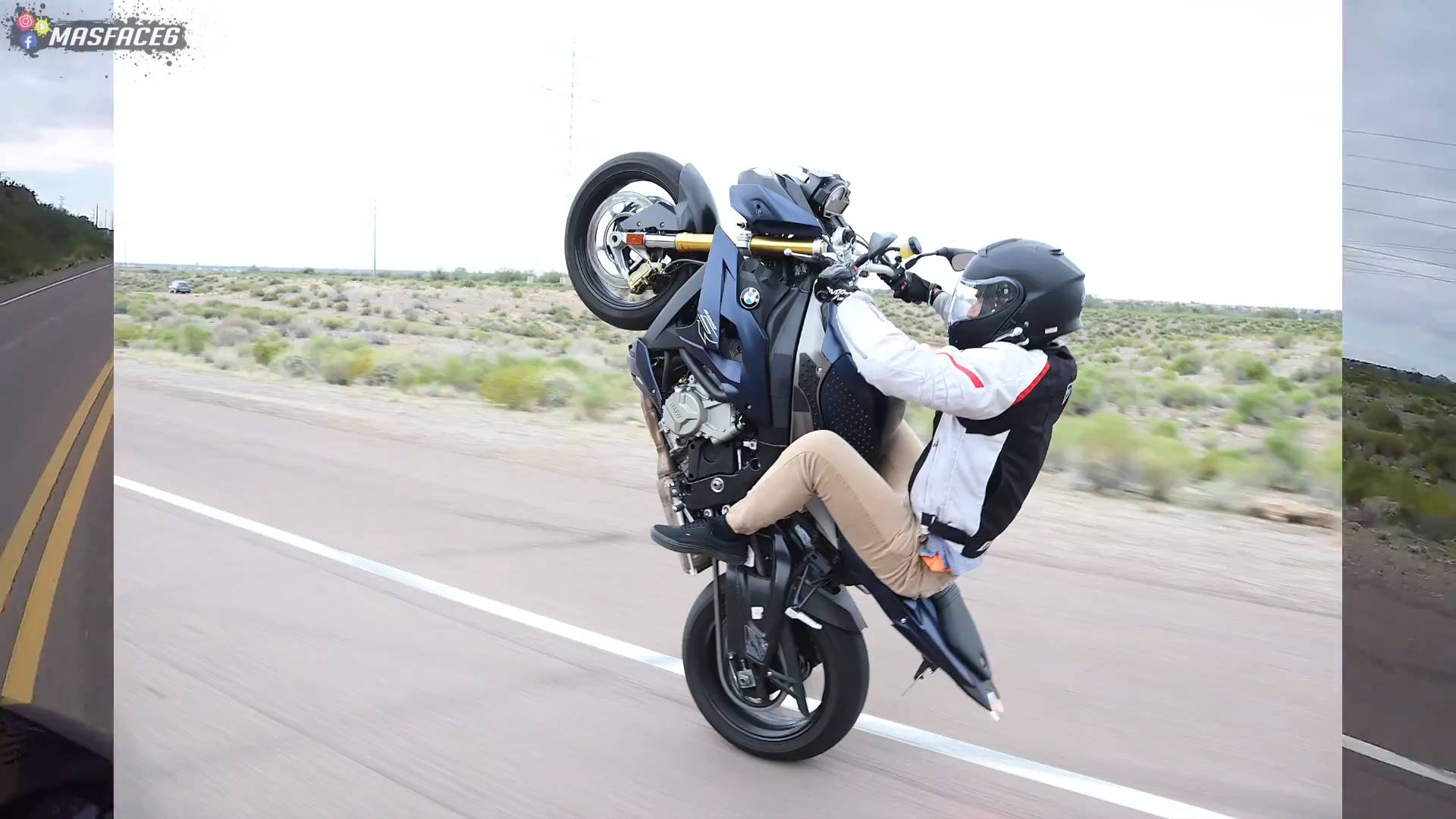 BMW rider showcases one-wheel riding skills
